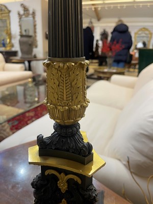 Lot 4 - A pair of large Empire-style gilt and patinated bronze candelabras