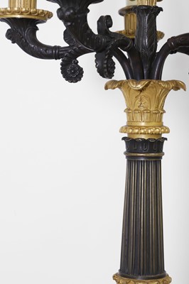 Lot 4 - A pair of large Empire-style gilt and patinated bronze candelabras