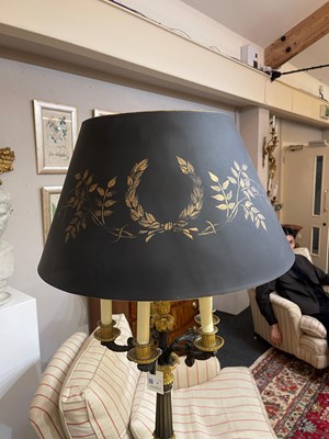 Lot 4 - A pair of large Empire-style gilt and patinated bronze candelabras