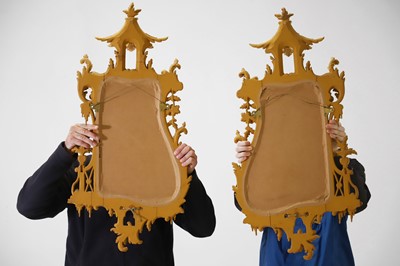 Lot 15 - A pair of George III-style carved giltwood girandoles in the Chippendale taste