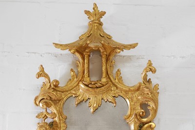 Lot 15 - A pair of George III-style carved giltwood girandoles in the Chippendale taste