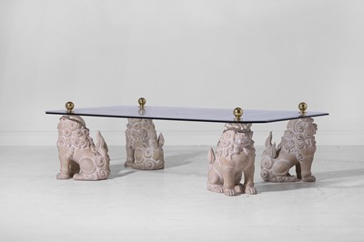 Lot 3 - A glass and composition coffee table