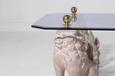 Lot 3 - A glass and composition coffee table