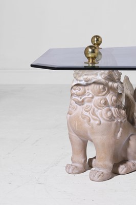 Lot 3 - A glass and composition coffee table