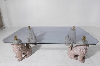 Lot 3 - A glass and composition coffee table