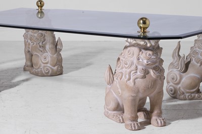 Lot 3 - A glass and composition coffee table