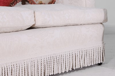 Lot 1 - A pair of upholstered three-seater sofas