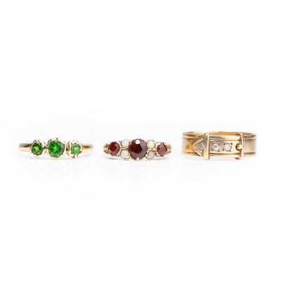Lot 1173 - A group of three gemstone set rings