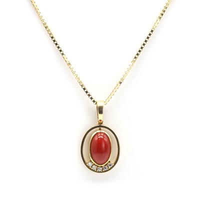 Lot 153 - A red coral and diamond pendant and chain