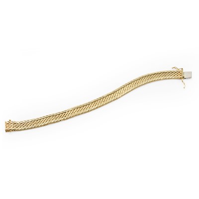 Lot 1072 - A 14ct gold strap bracelet