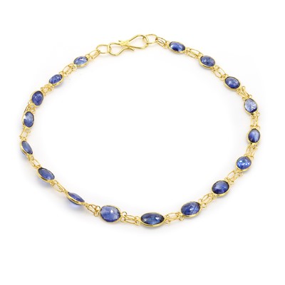 Lot 140 - A sapphire line bracelet