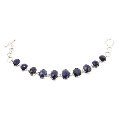 Lot 1125 - A silver sapphire bracelet