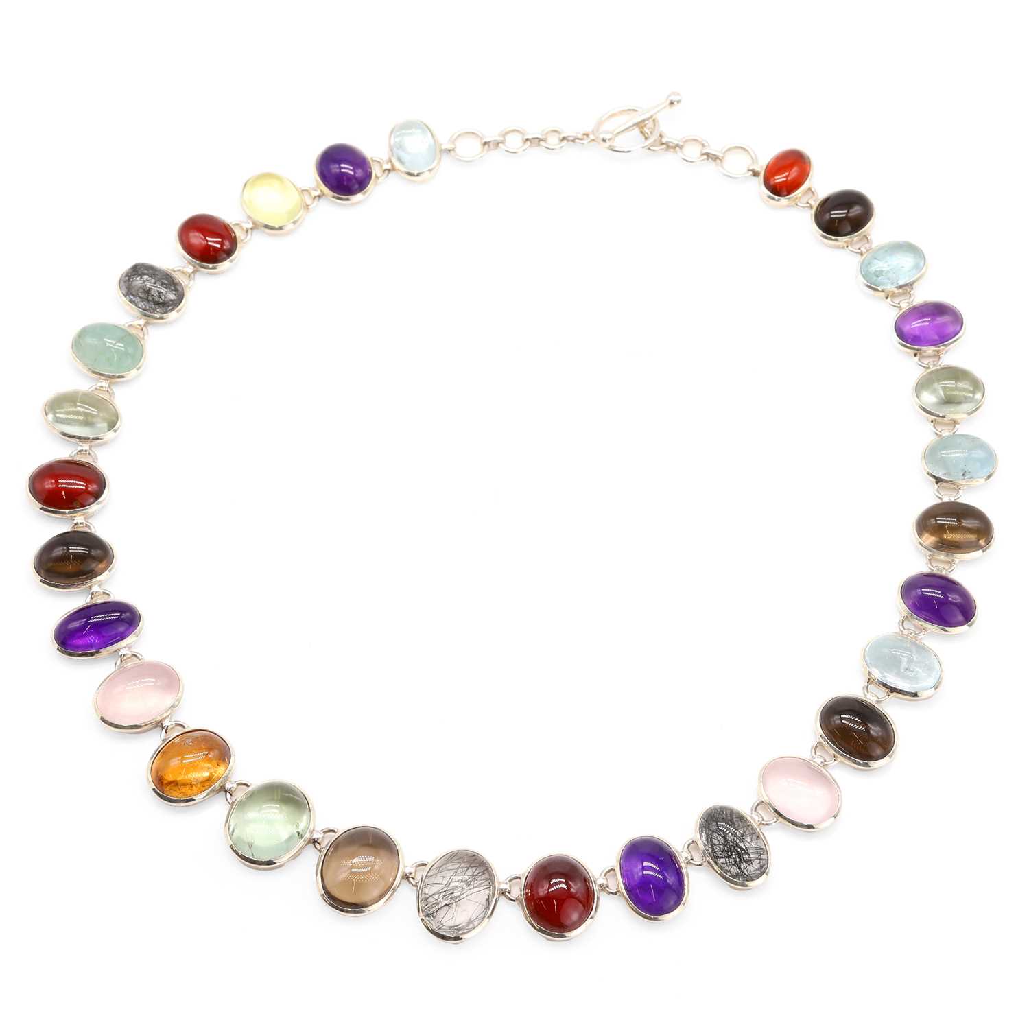Lot 1143 - A silver multi-gemstone necklace
