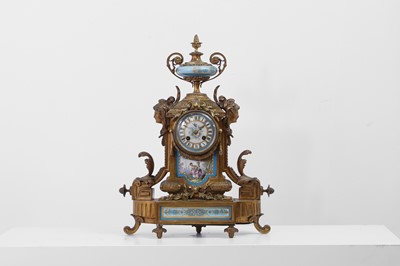 Lot 42 - A Louis XVI Revival ormolu and porcelain mantel clock