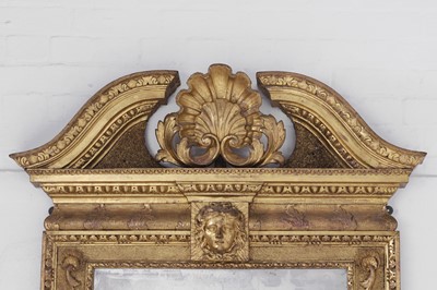 Lot 239 - A George II carved giltwood pier mirror
