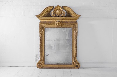 Lot 239 - A George II carved giltwood pier mirror