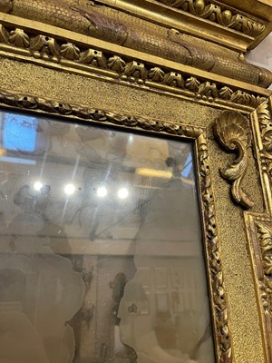 Lot 239 - A George II carved giltwood pier mirror