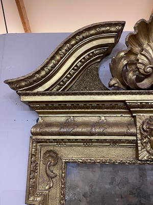 Lot 239 - A George II carved giltwood pier mirror