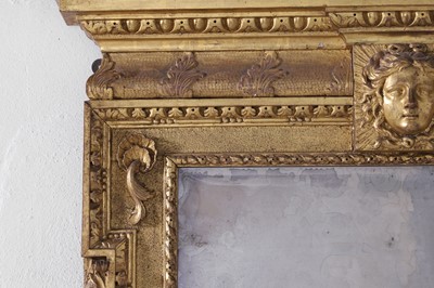 Lot 239 - A George II carved giltwood pier mirror