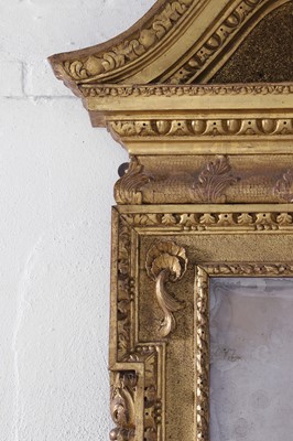 Lot 239 - A George II carved giltwood pier mirror