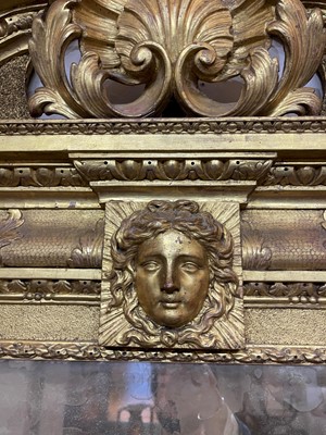 Lot 239 - A George II carved giltwood pier mirror