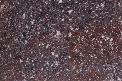 Lot 290 - A polished imperial porphyry fragment