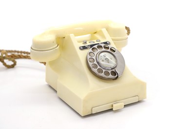 Lot 304 - A GPO ivory Bakelite telephone