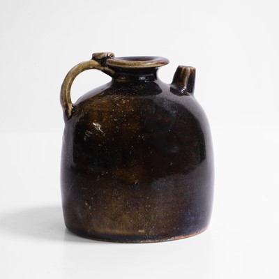 Lot 7 - A Chinese black-glazed ewer