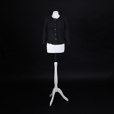Lot 1372 - A Chanel black collarless jacket