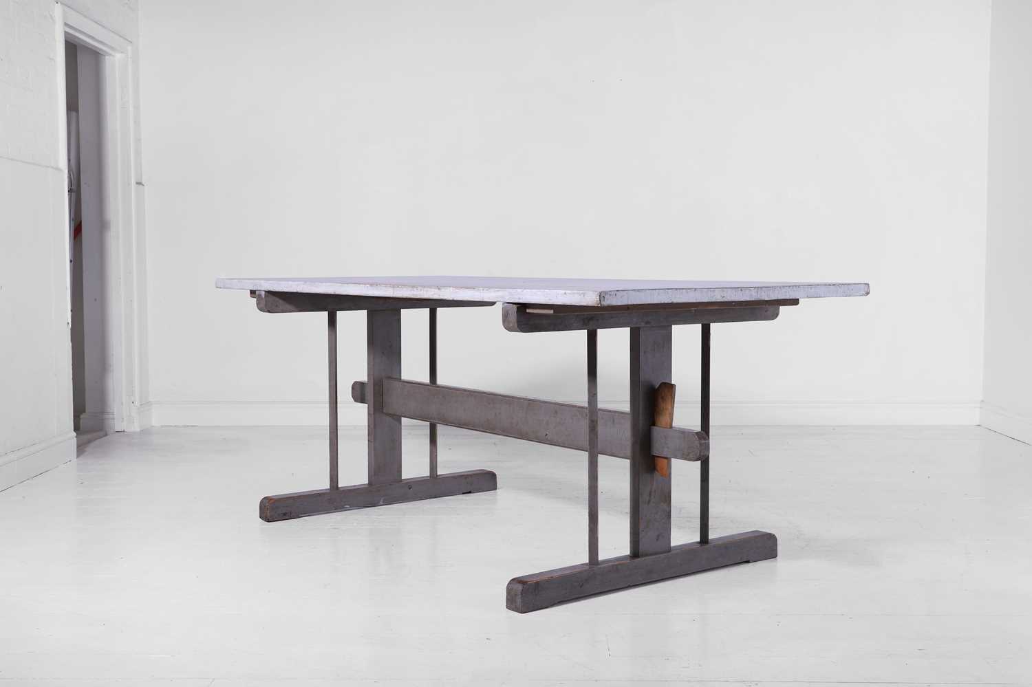 Lot 288 - A provincial painted wooden dining table