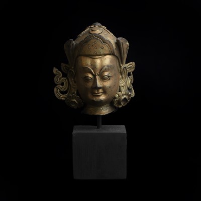Lot 168 - A Tibetan gilt-bronze head of a bodhisattva
