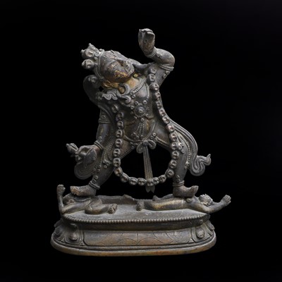 Lot 124 - A parcel-gilt bronze figure of a dakini