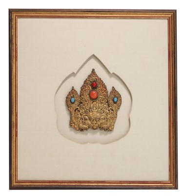 Lot 68 - A Tibetan gilt-metal plaque