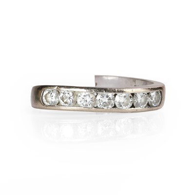 Lot 1043 - An 18ct white gold diamond seven stone ring