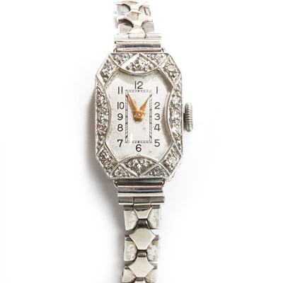 Lot 1313 - A 9ct white gold diamond mechanical cocktail watch