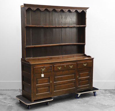 Lot 513 - A George III oak dresser