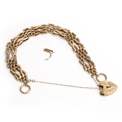 Lot 1253 - A 9ct gold gate bracelet