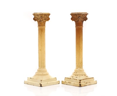 Lot 108 - A pair of creamware Corinthian column candlesticks