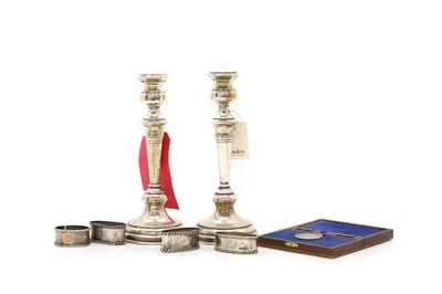 Lot 3 - A pair of Continental silver candlesticks