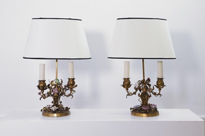 Lot 18 - A pair of Louis XV-style gilt-metal and porcelain lamps