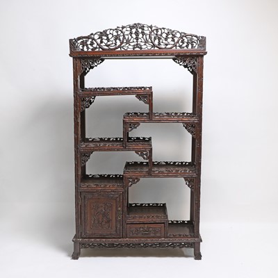 Lot 305 - A Chinese hardwood display cabinet