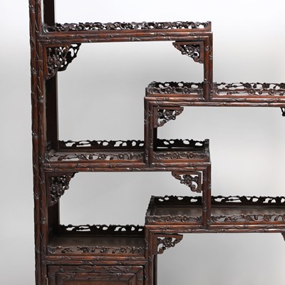 Lot 305 - A Chinese hardwood display cabinet