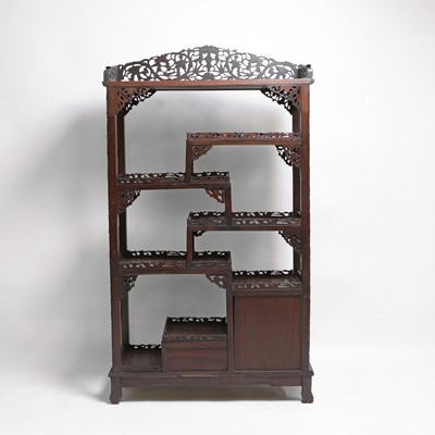 Lot 305 - A Chinese hardwood display cabinet