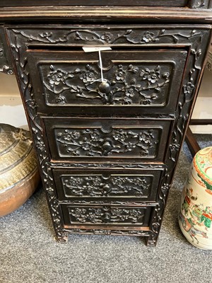 Lot 152 - A Chinese carved hardwood kneehole desk