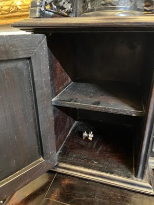 Lot 152 - A Chinese carved hardwood kneehole desk