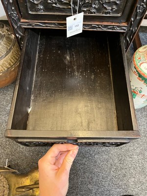 Lot 152 - A Chinese carved hardwood kneehole desk