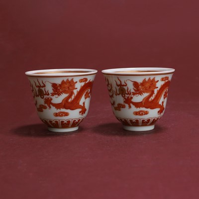 Lot 115 - A pair of Chinese porcelain iron-red wine cups
