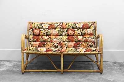 Lot 507 - A two-seater bamboo and rattan sofa