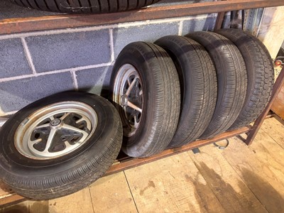 Lot 124 - A set of five MGB Rostyle steel wheels