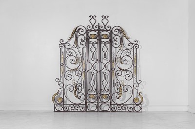 Lot 536 - A pair of painted and parcel-gilt wrought-iron gates